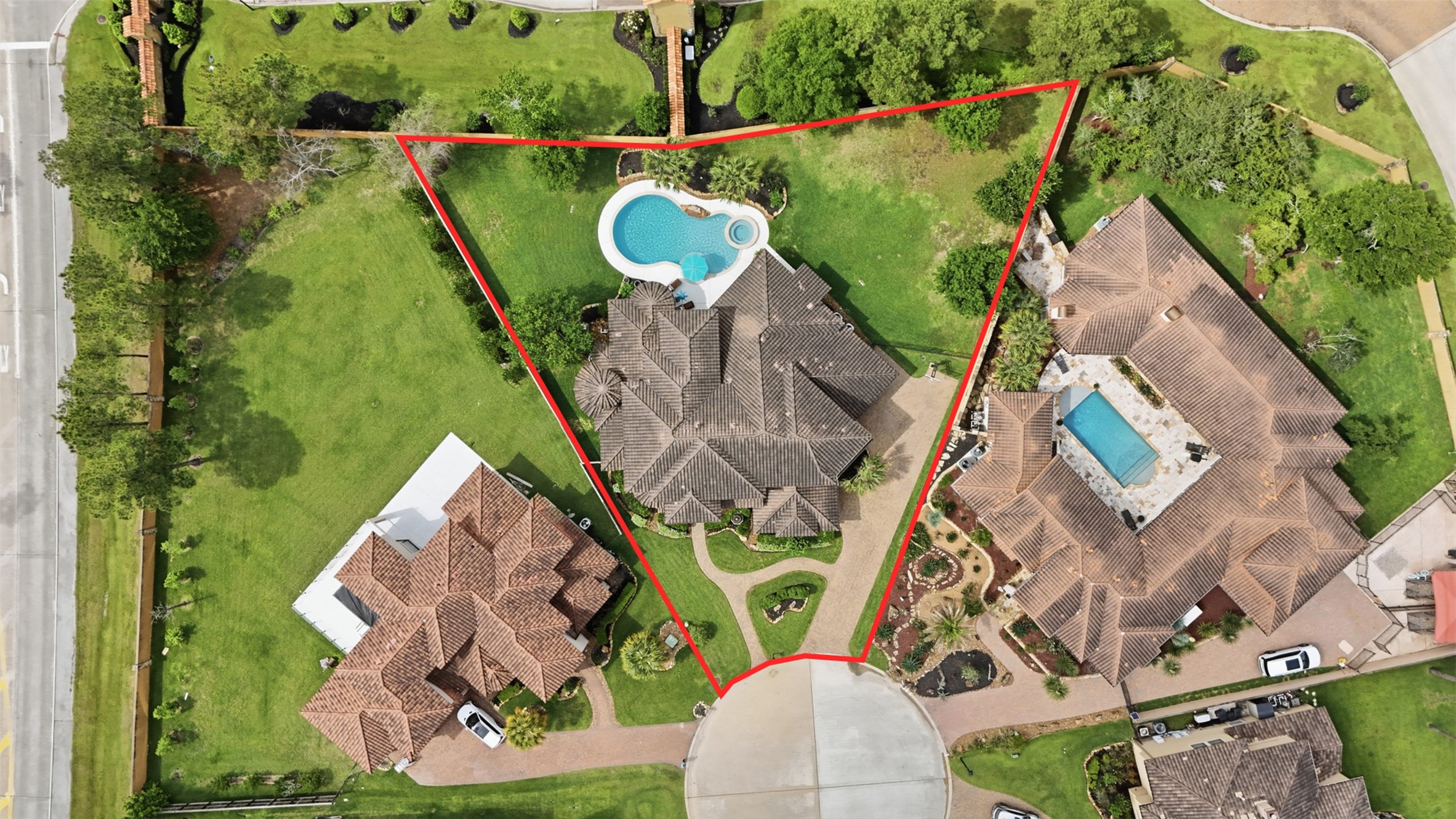 14 Post Shadow Estate Drive Spring, TX 77389 - Photo 48 of 49 an aerial view of a house with a garden and swimming pool