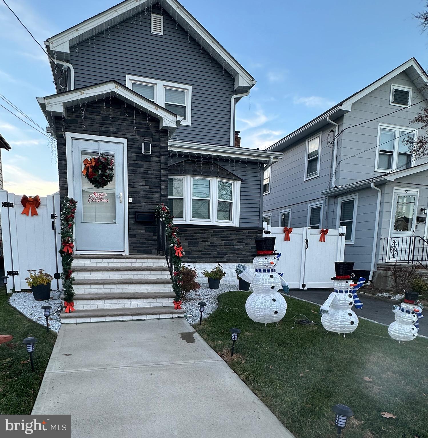 a view of a house with sitting area and furniture