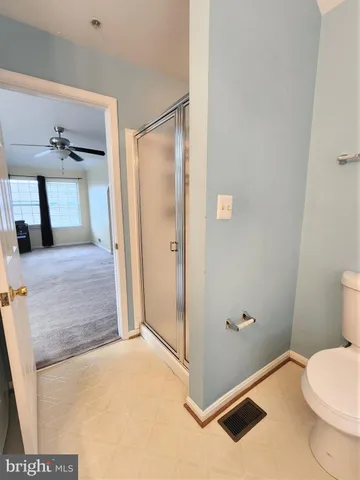 a bathroom with a sink a mirror and window