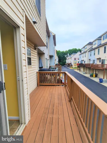a view of backyard with large trees