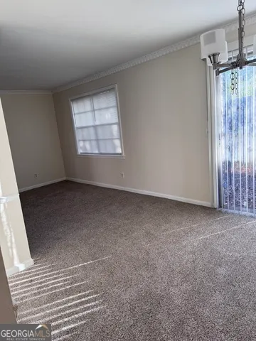 a bathroom with a sink vanity mirror and toilet