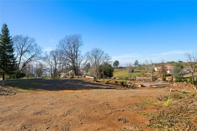 a view of a yard with swimming pool
