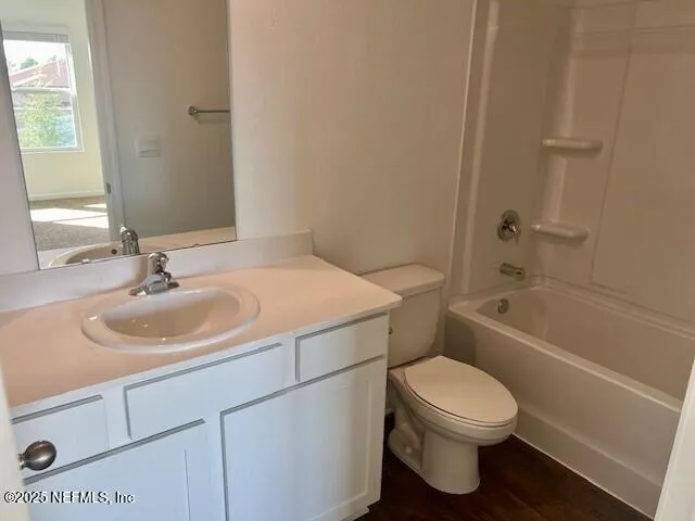 a en suite bathroom with a sink toilet and shower