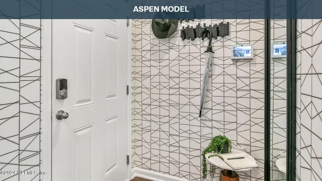 a kitchen with stainless steel appliances a white stove top oven and a refrigerator