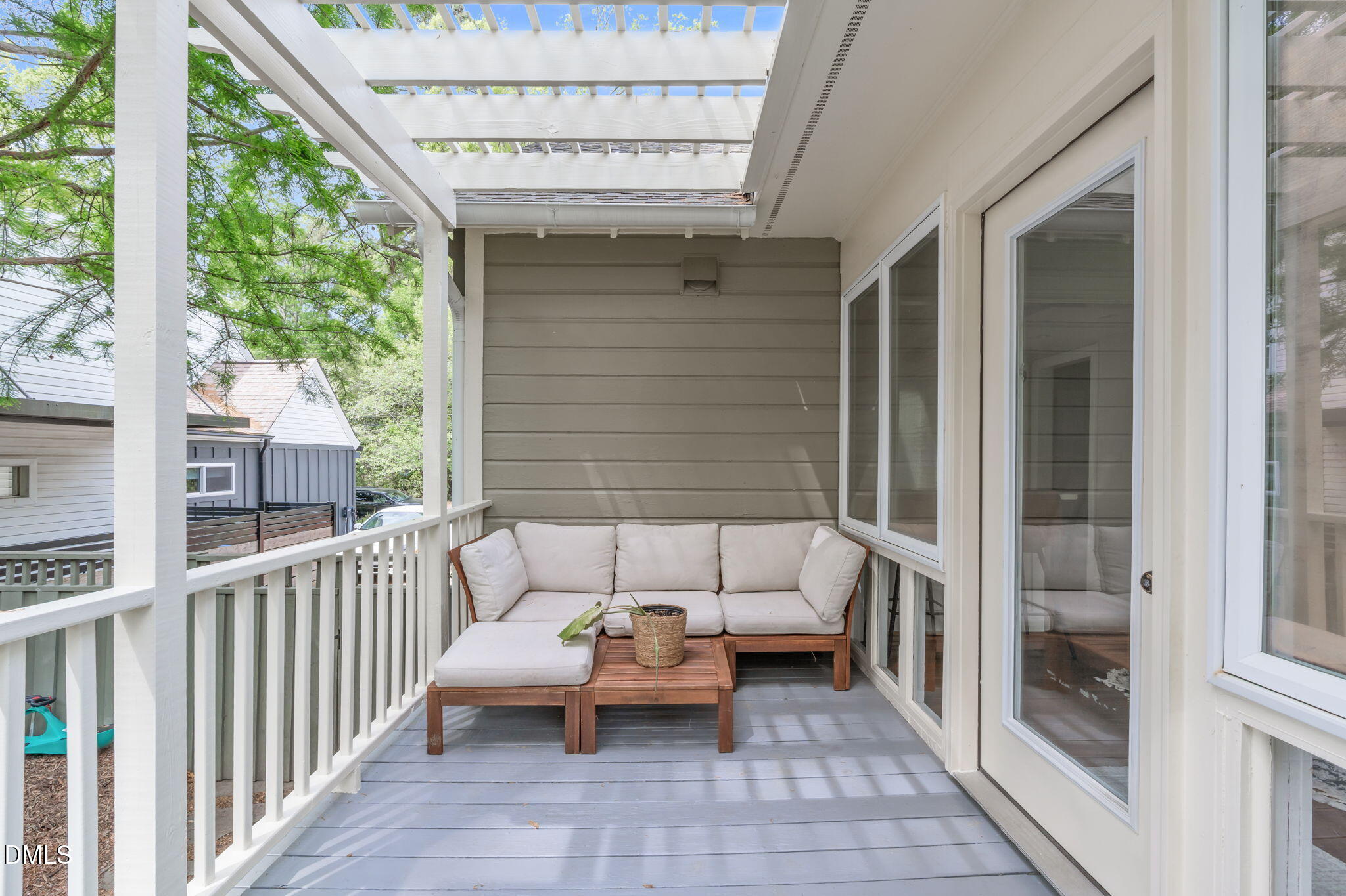 2111 Pershing Street Durham, NC 27705 - Photo 44 of 59 a balcony with furniture and wooden floor