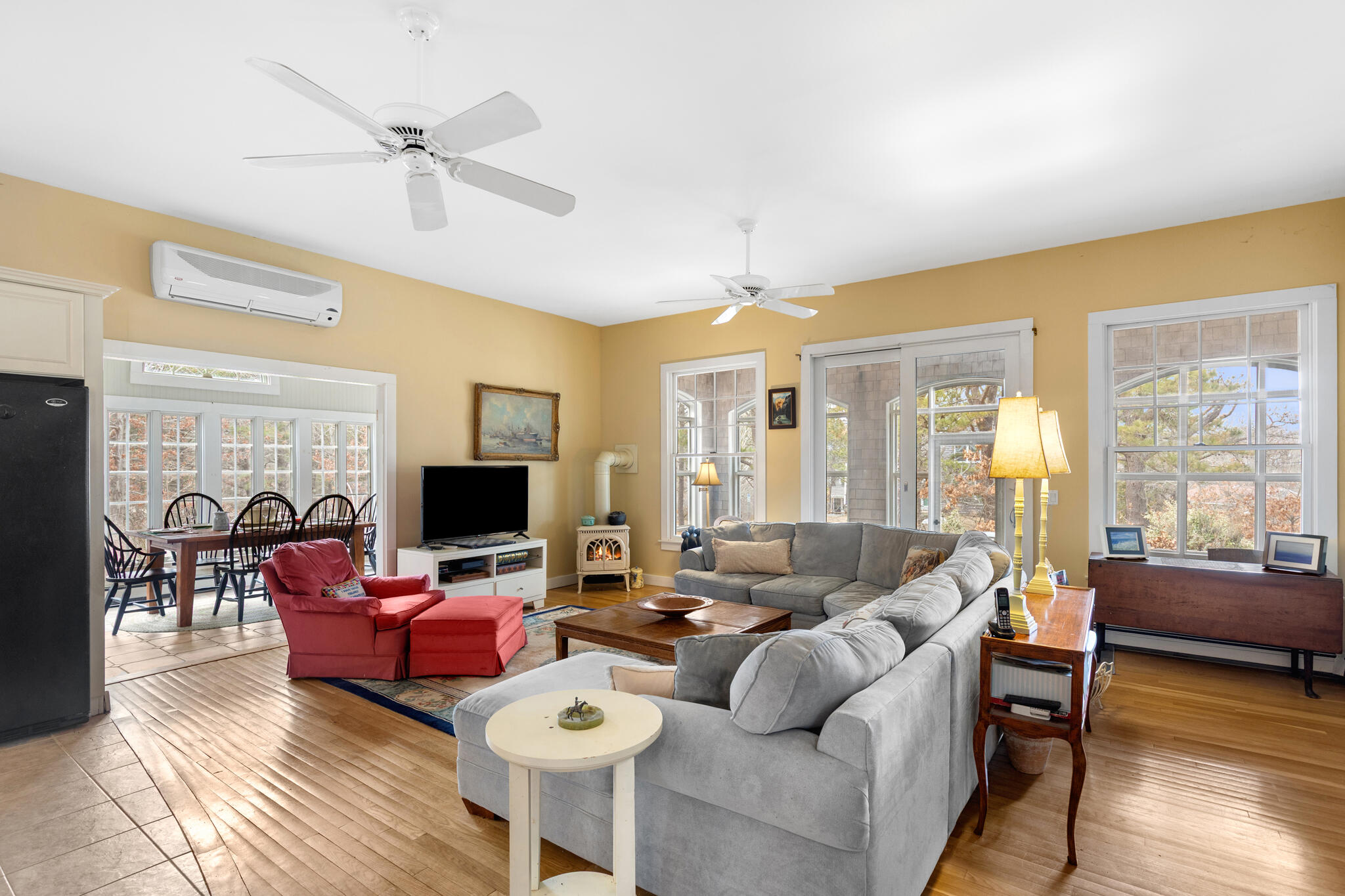311 South Sunken Meadow Road Eastham, MA 02642 - Photo 8 of 57 a living room with furniture and a flat screen tv
