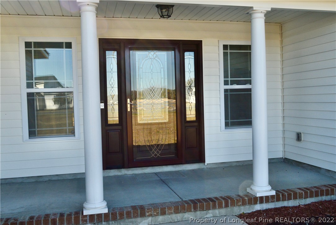 3011 Hayfield Road Wade, NC 28395 - Photo 5 of 15 a view of front door of house