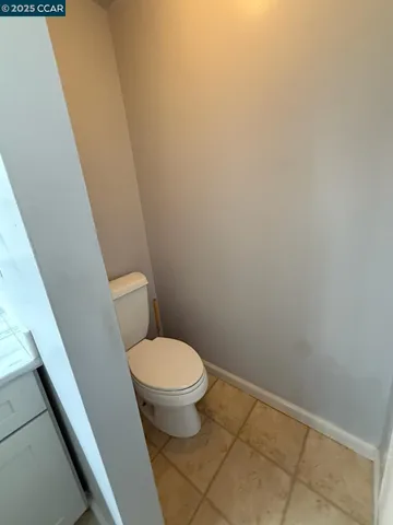 a bathroom with a toilet and a sink