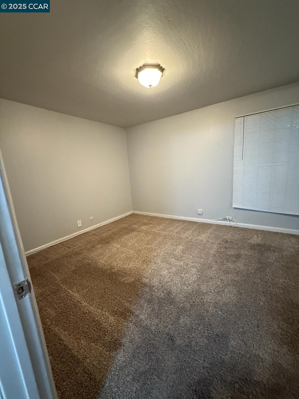 2061 Vanderslice Avenue Walnut Creek, CA 94596 - Photo 12 of 15 an empty room with a workbench