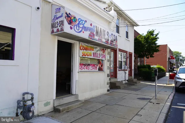 a view of street with sitting area