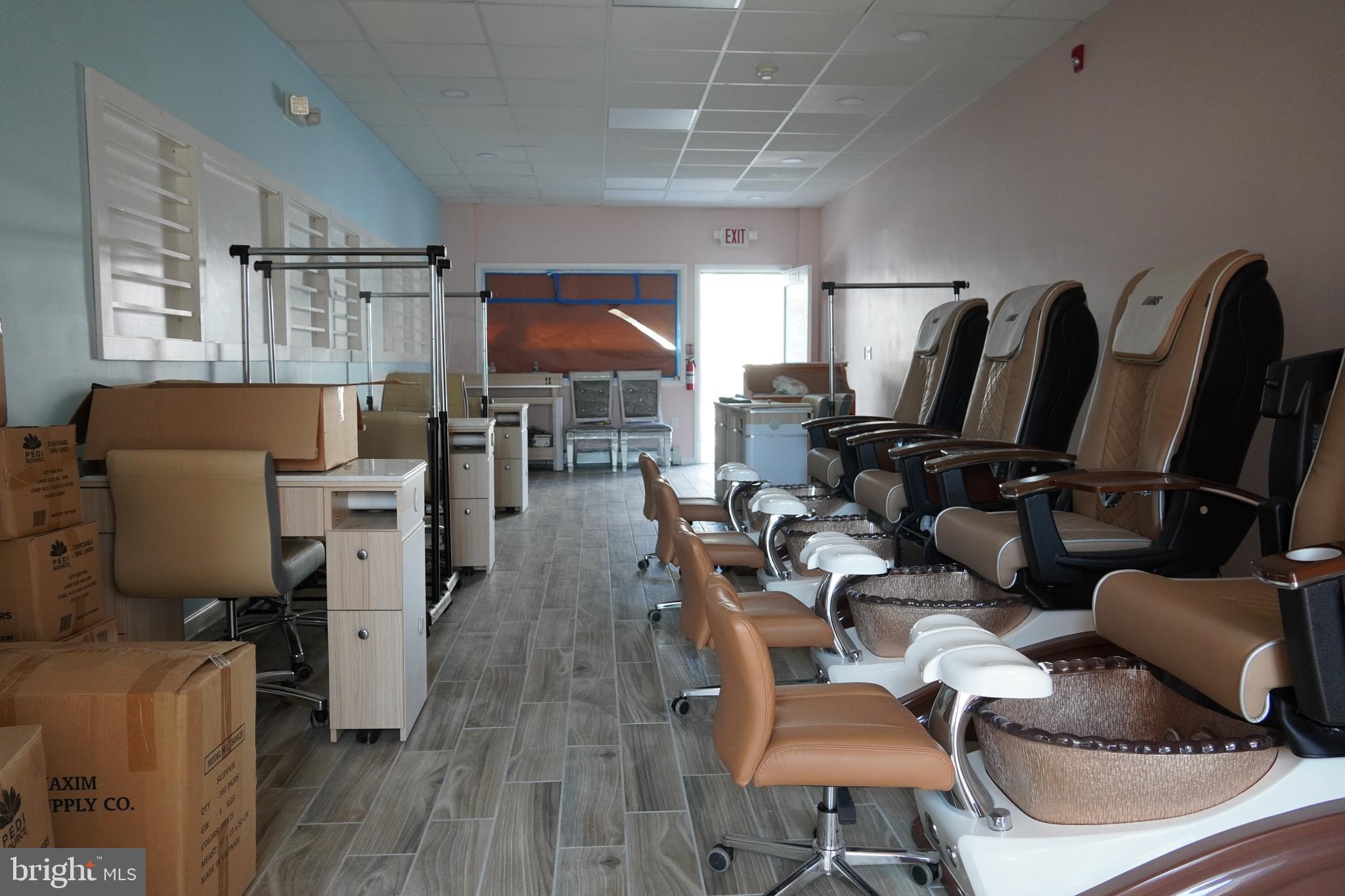 3708 Garrett Road Drexel Hill, PA 19026 - Photo 7 of 12 a living room with furniture a wooden floor and a large window