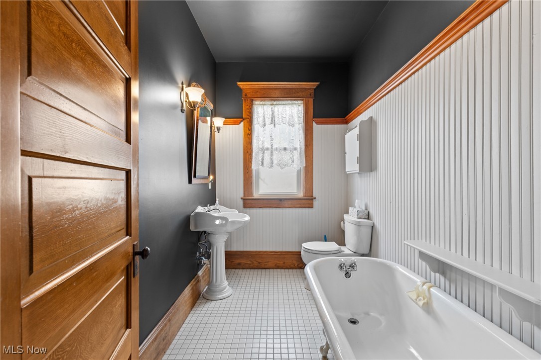 1011 Parriott Avenue Moundsville, WV 26041 - Photo 25 of 44 Bathroom with a freestanding bath and light tile patterned floors