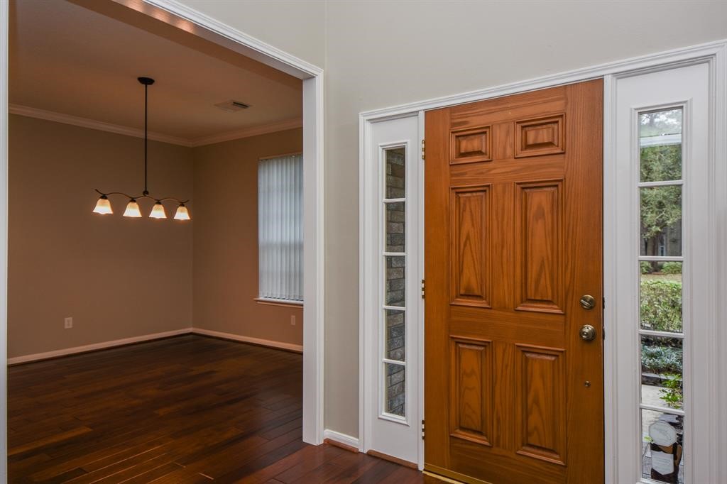 27 West Rumple Creek Place Spring, TX 77381 - Photo 5 of 32 Beautiful wood floors flow throughout this home.