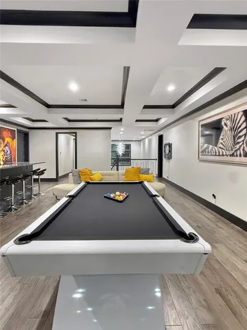 a view of a kitchen with lots of car parked in it