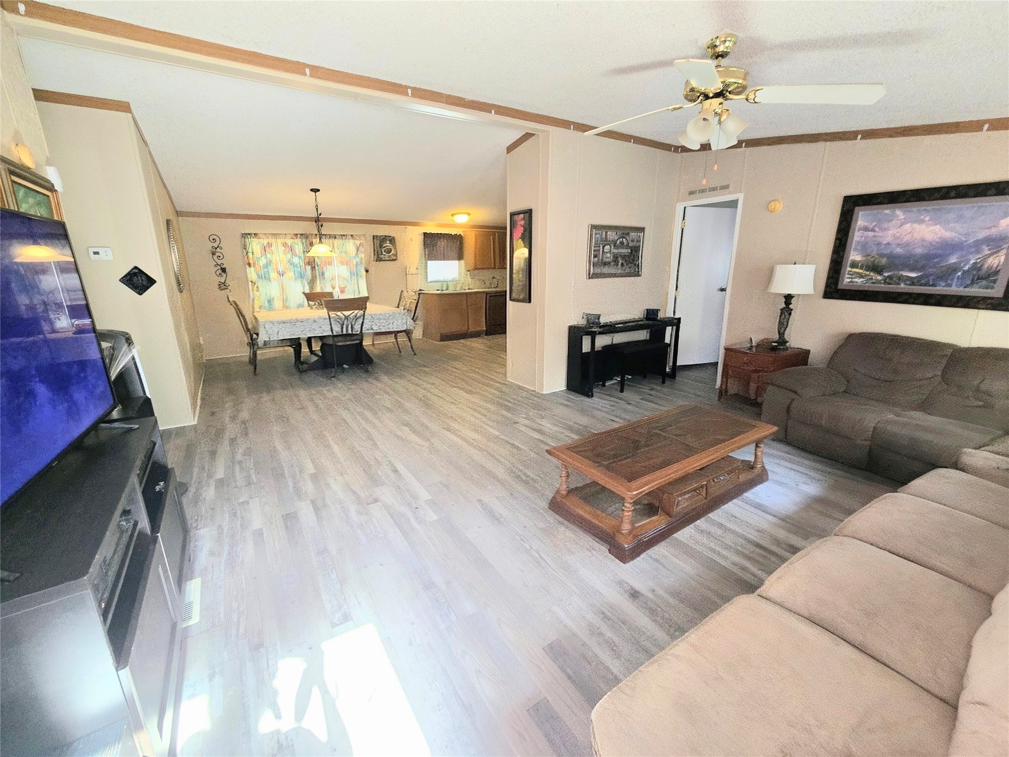 118 Noel Livingston, TX 77351 - Photo 3 of 13 a living room with furniture and a fireplace