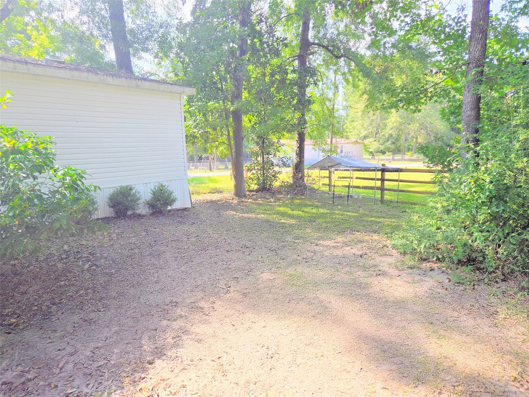 118 Noel Livingston, TX 77351 - Photo 10 of 13 a view of backyard with swimming pool and seating space
