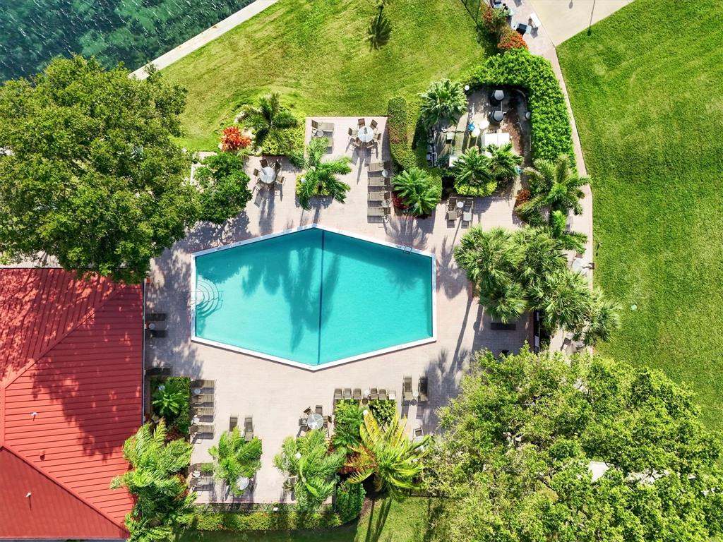 3050 Northeast 48th Court, Unit 401 Lighthouse Point, FL 33064 - Photo 39 of 53 an aerial view of a residential houses with outdoor space and trees all around