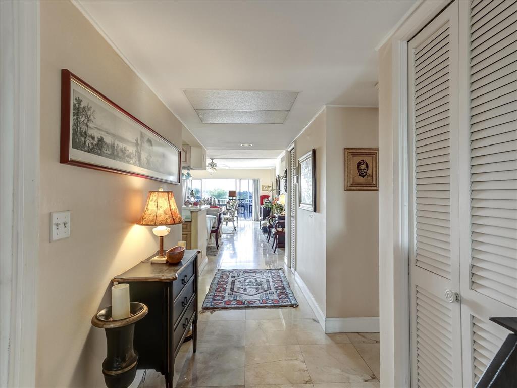 3050 Northeast 48th Court, Unit 401 Lighthouse Point, FL 33064 - Photo 8 of 53 a view of entryway with livingroom and furniture