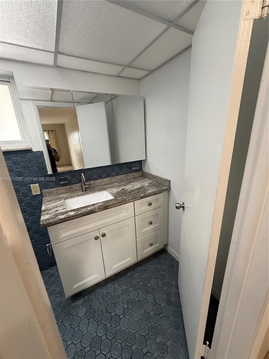 6841 Pembroke Road, Unit 15 Pembroke Pines, FL 33023 - Photo 13 of 16 a utility room with dryer and washer