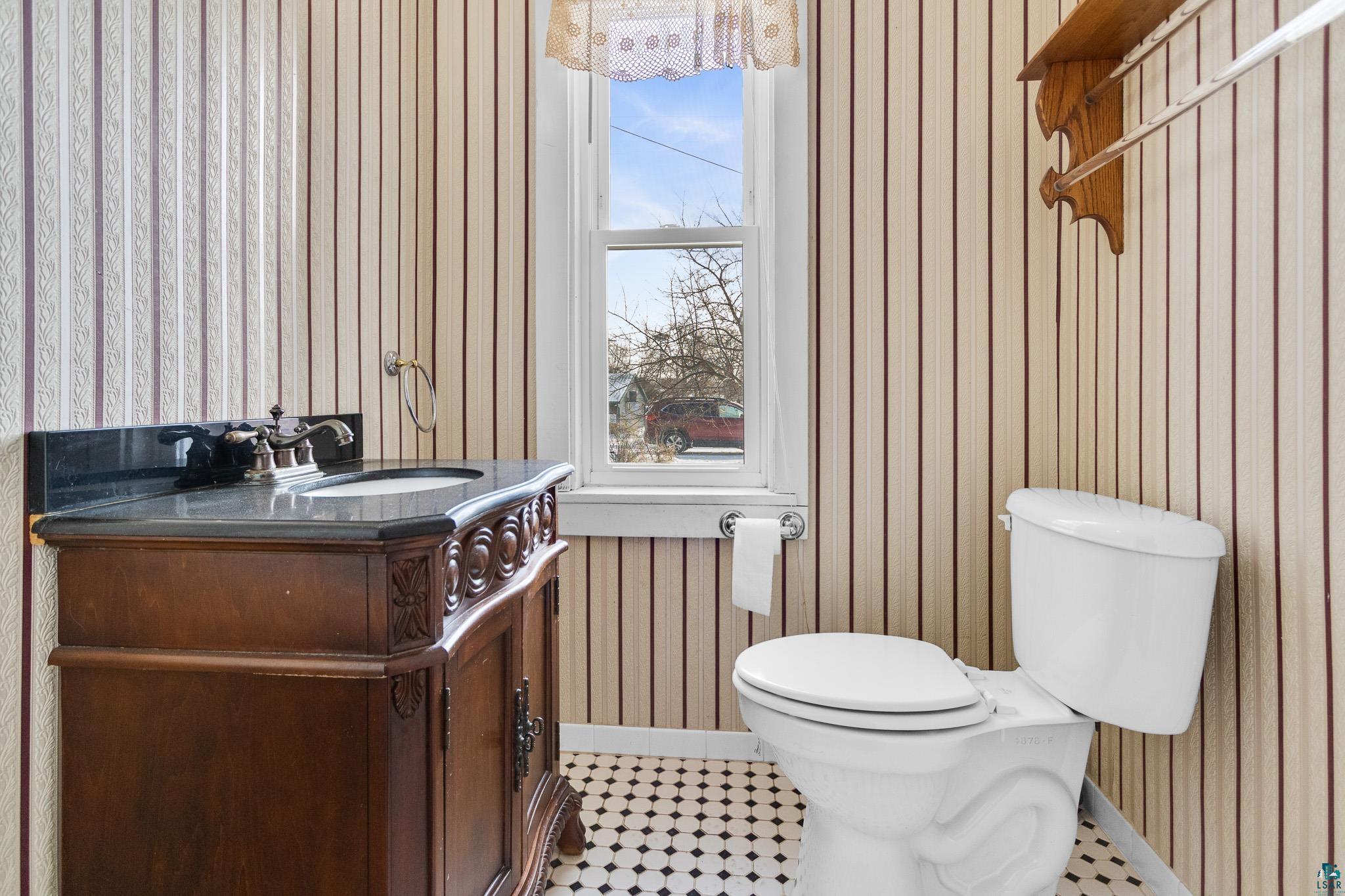 6494 School Street Finlayson, MN 55735 - Photo 24 of 31 Bathroom featuring toilet and vanity