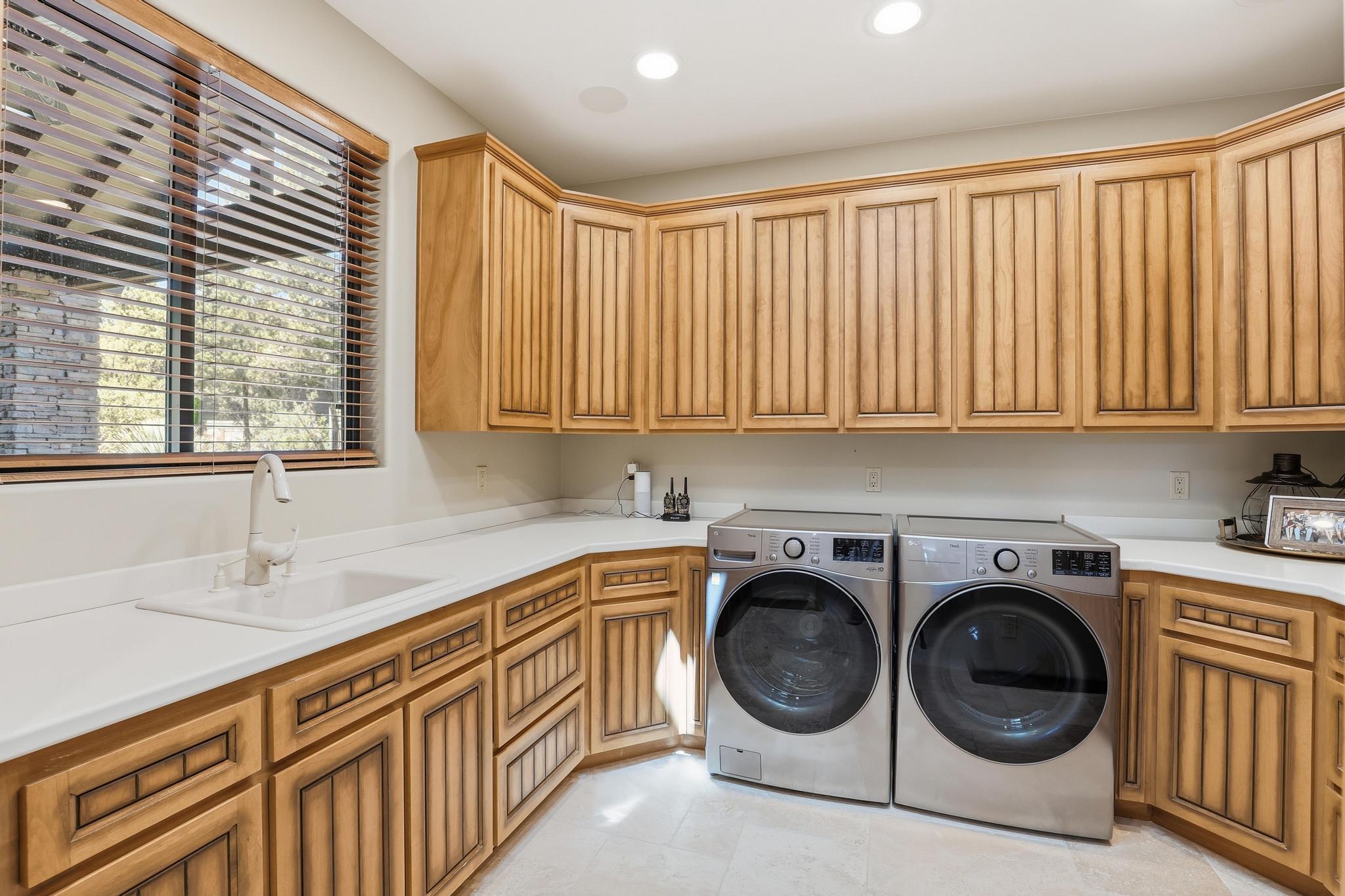 2908 East Rim Club Drive Payson, AZ 85541 - Photo 22 of 77 a utility room with sink dryer and washer
