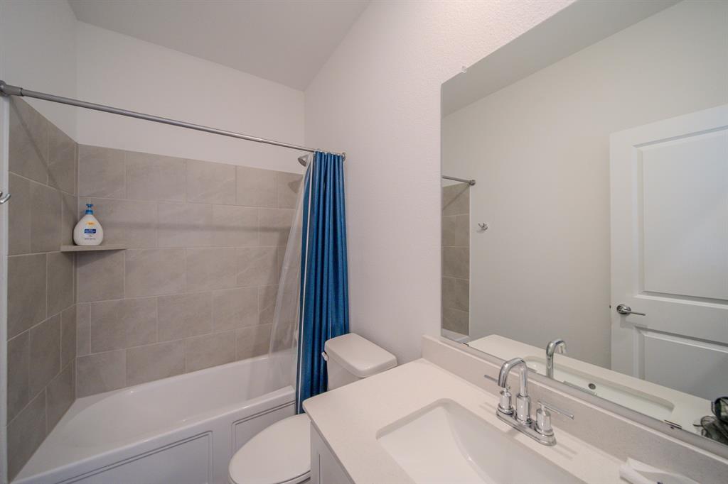 3617 Swan Shadow Mesquite, TX 75181 - Photo 14 of 21 a bathroom with a sink toilet and shower