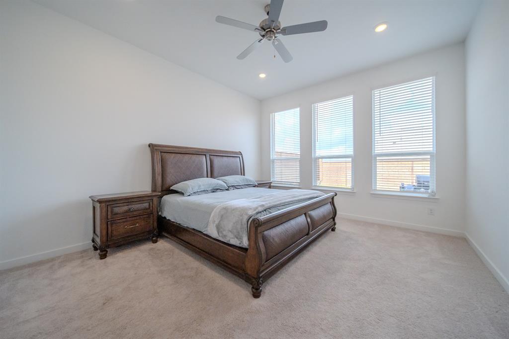 3617 Swan Shadow Mesquite, TX 75181 - Photo 9 of 21 a spacious bedroom with a bed and a window