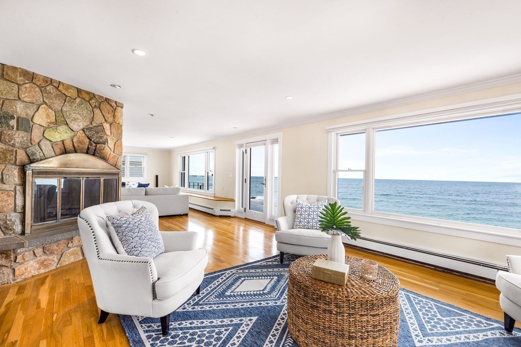 67 Surfside Road Scituate, MA 02066 - Photo 16 of 41 a living room with furniture and a potted plant