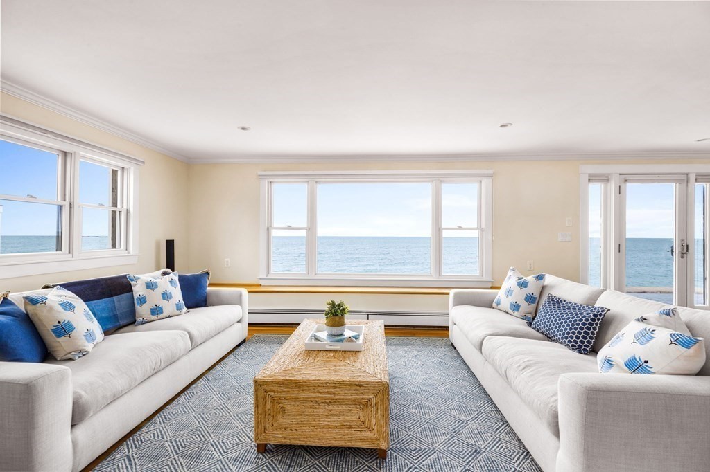 67 Surfside Road Scituate, MA 02066 - Photo 19 of 41 a living room with furniture and a large window