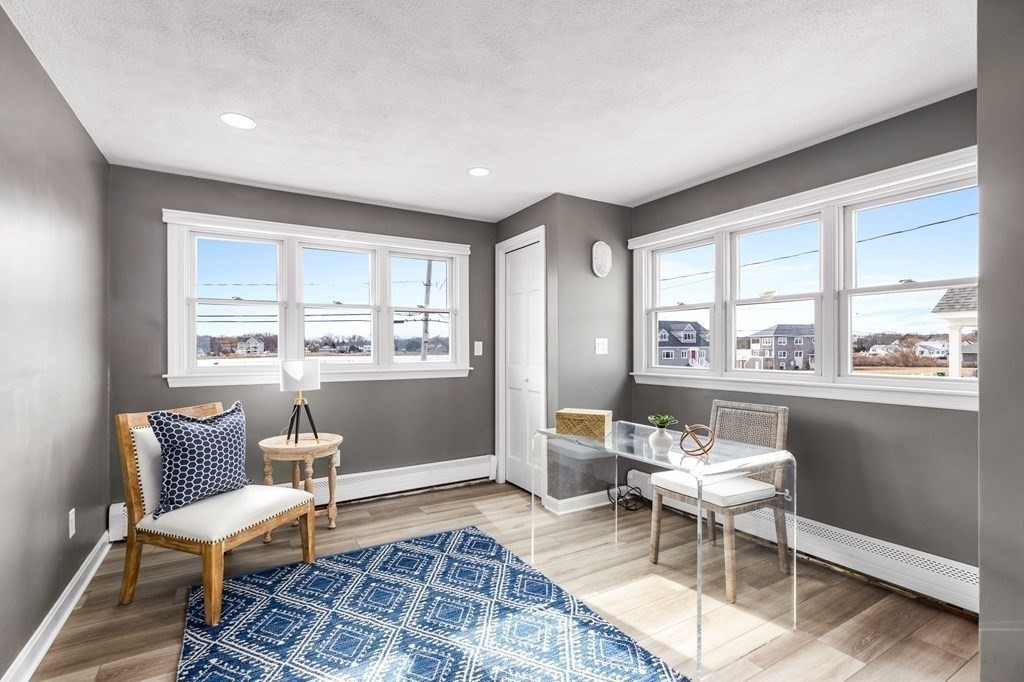 67 Surfside Road Scituate, MA 02066 - Photo 22 of 41 a living room with furniture and a window