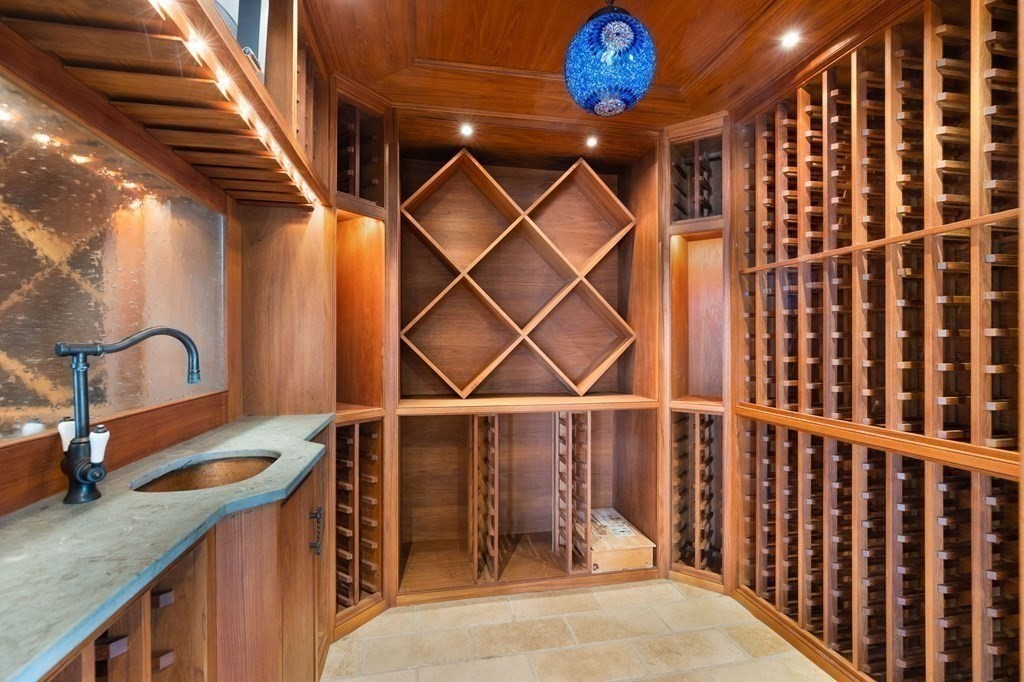 67 Surfside Road Scituate, MA 02066 - Photo 25 of 41 a view of a kitchen with a sink and cabinets