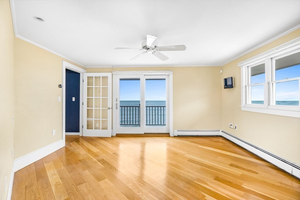 67 Surfside Road Scituate, MA 02066 - Photo 28 of 41 a view of an empty room with a window