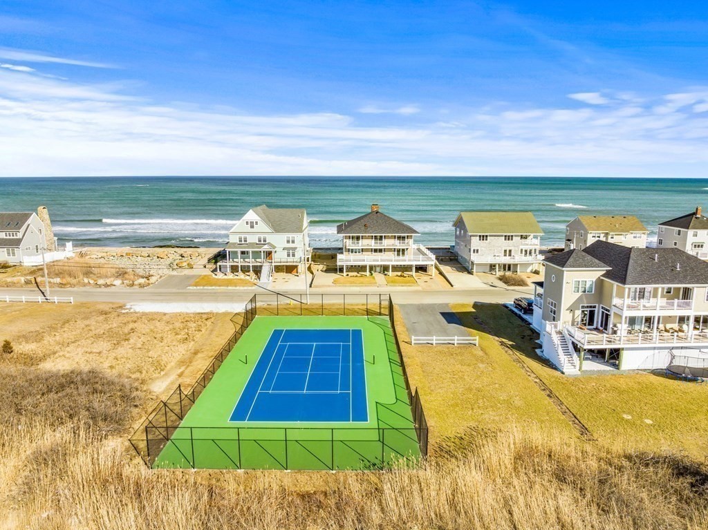 67 Surfside Road Scituate, MA 02066 - Photo 35 of 41 a view of a swimming pool with an outdoor seating