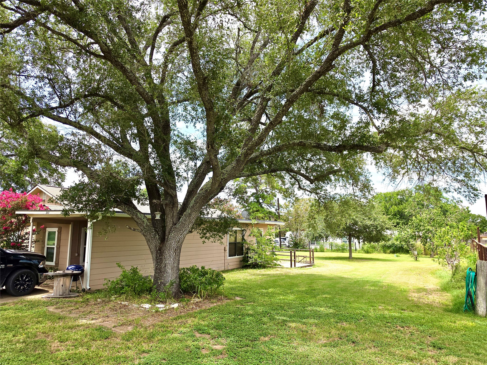 307 5th Street Sutherland Springs, TX 78161 - Photo 2 of 17 a view of a yard in front of the house