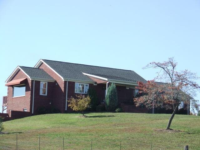 590 Kansas Road Waco, GA 30182 - Photo 1 of 1 a front view of a house with a yard