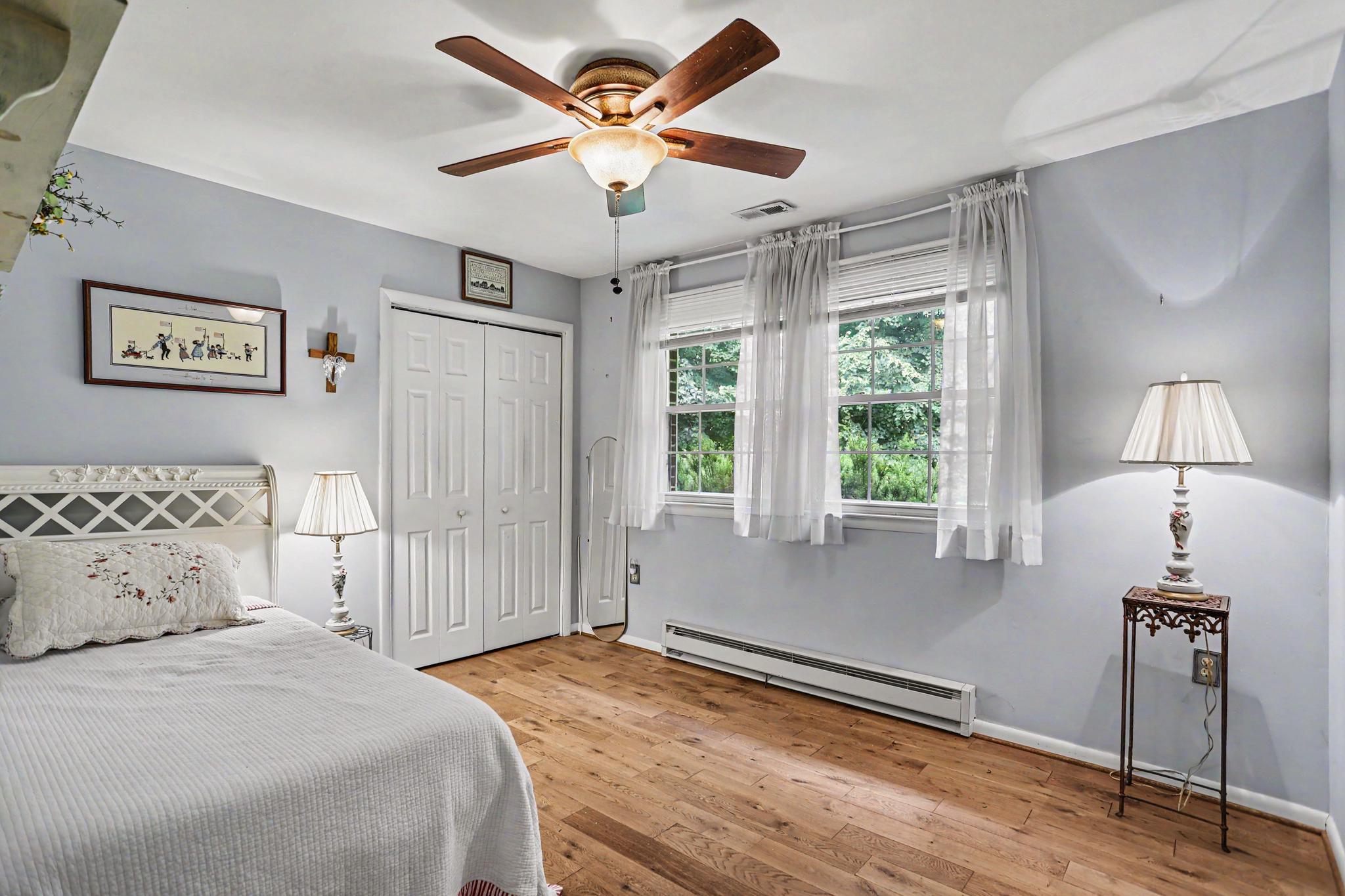 2226 Harney Road Littlestown, PA 17340 - Photo 20 of 40 a bedroom with a large bed and a window