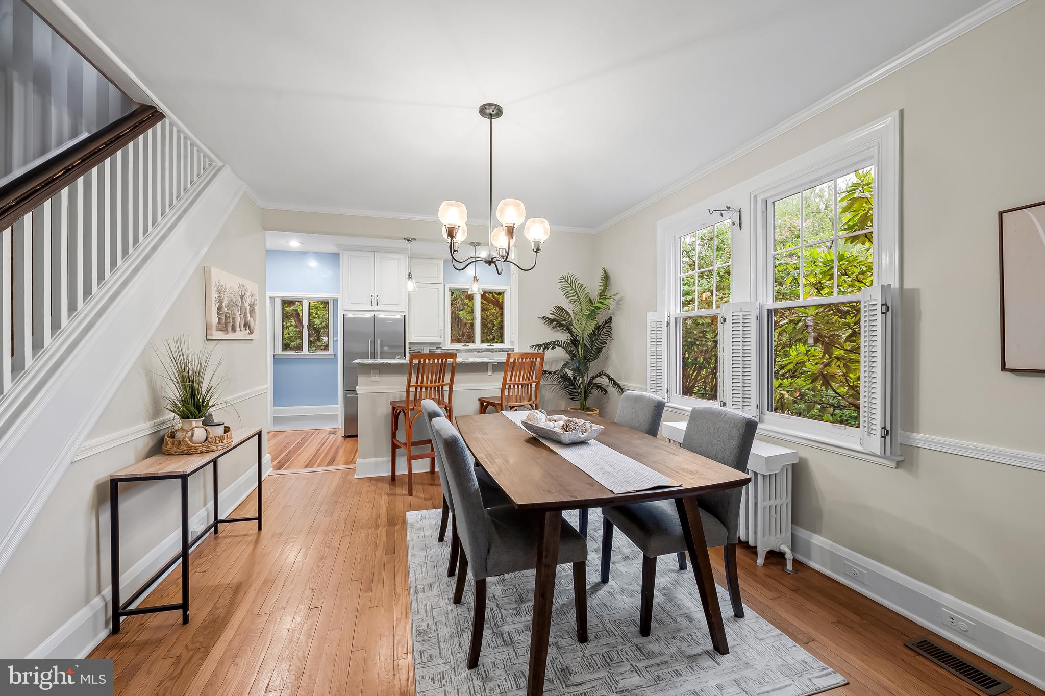 529 Overbrook Road Baltimore, MD 21212 - Photo 9 of 40 a dining room with furniture a chandelier and wooden floor