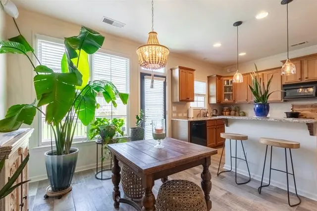 a bedroom with a bed and lamp