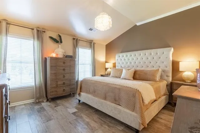 a bathroom with a sink a vanity and a mirror