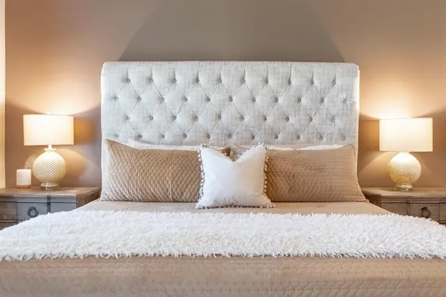 a view of walk in closet with clothes