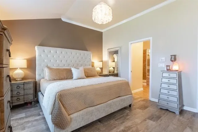 a bathroom with a sink mirror vanity and toilet