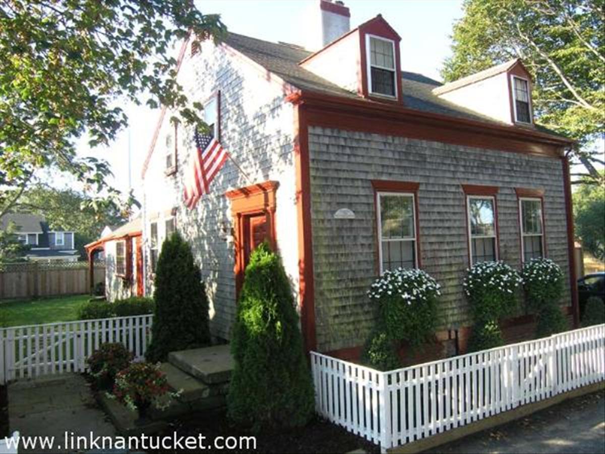 16 Vestal Street Nantucket, MA 02554 - Photo 2 of 10 a view of a house with a garden