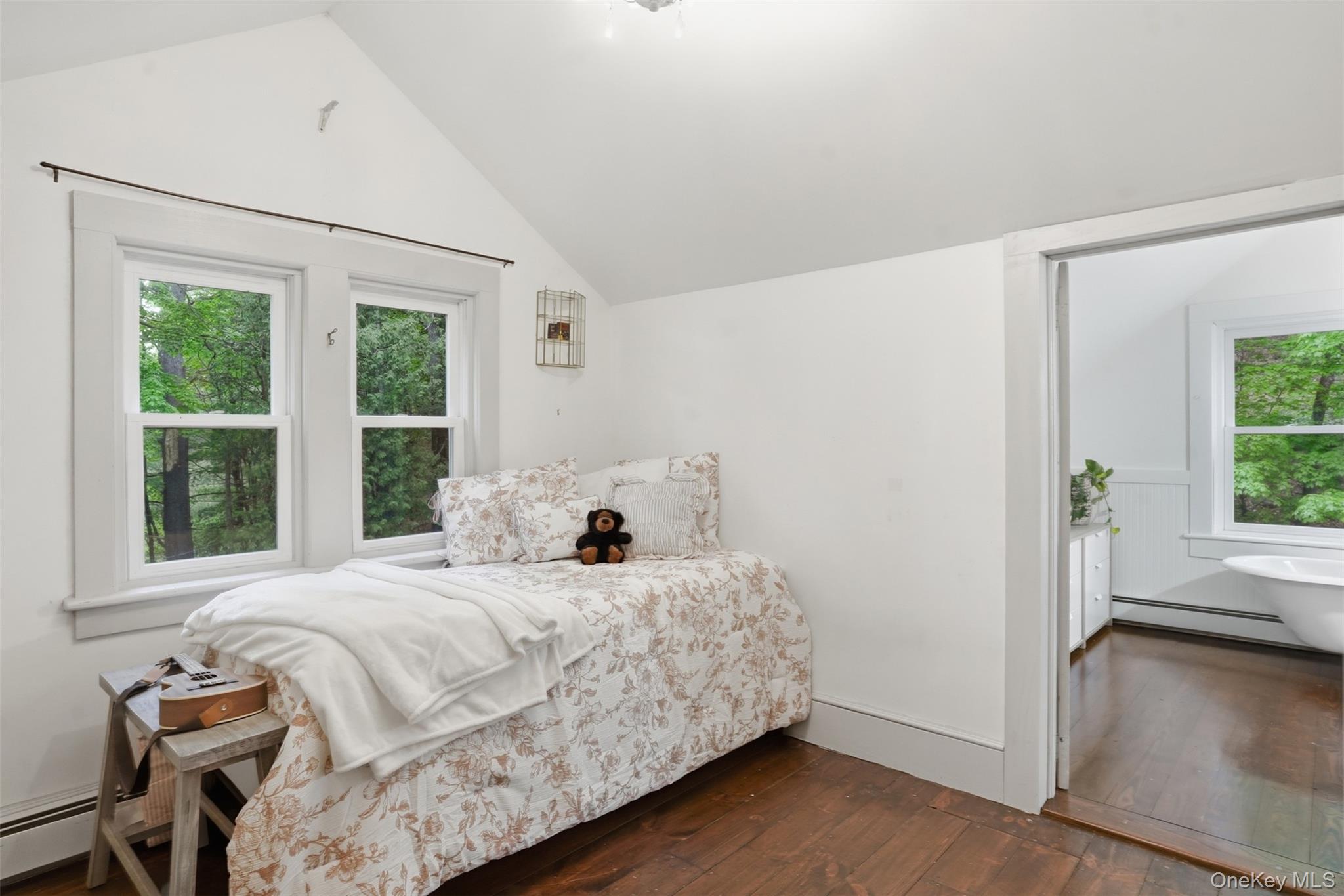 726 Wittenberg Road Mount Tremper, NY 12457 - Photo 20 of 32 a bedroom with a bed and a window