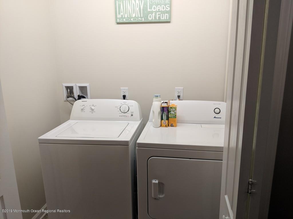 611 Riverside Drive Bayville, NJ 08721 - Photo 16 of 22 a utility room with dryer and washer