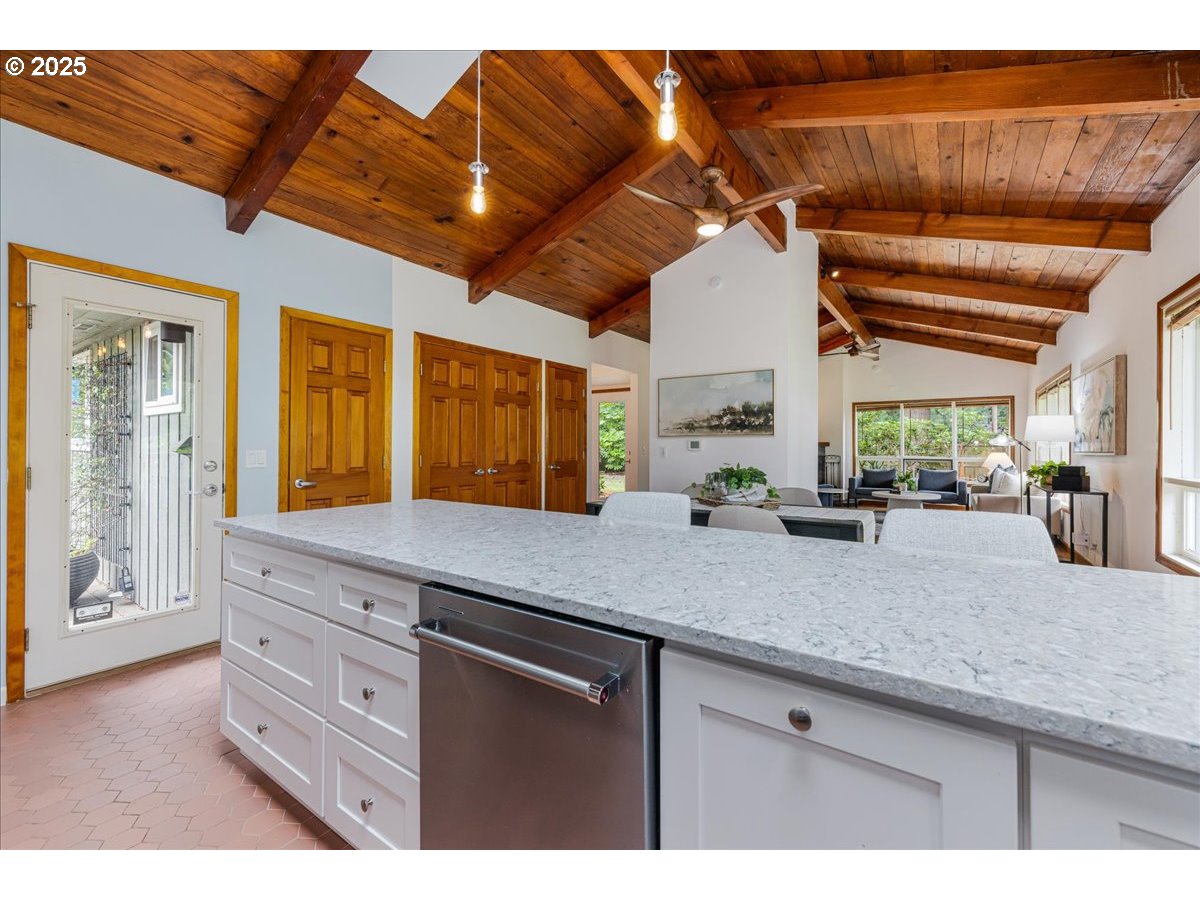 11805 Southwest Belvidere Place Portland, OR 97225 - Photo 13 of 44 a kitchen with a sink and cabinets