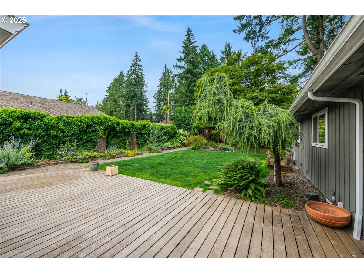 11805 Southwest Belvidere Place Portland, OR 97225 - Photo 28 of 44 a view of a backyard with sitting area