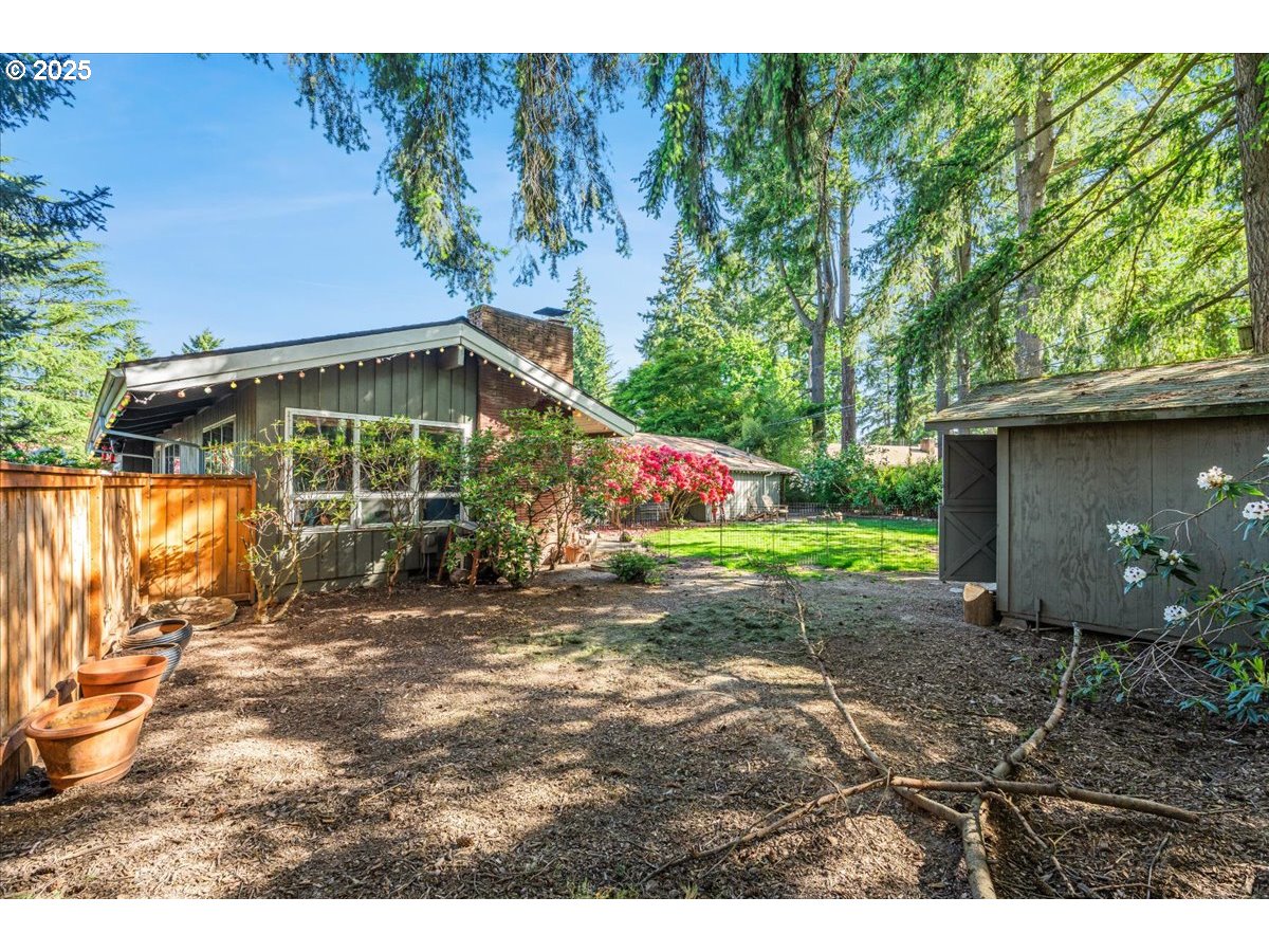 11805 Southwest Belvidere Place Portland, OR 97225 - Photo 36 of 44 a view of a house with a yard