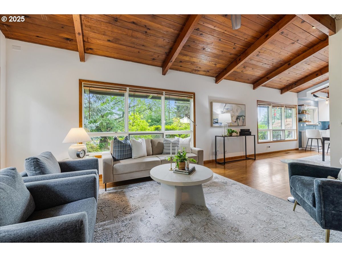 11805 Southwest Belvidere Place Portland, OR 97225 - Photo 6 of 44 a living room with furniture and a large window
