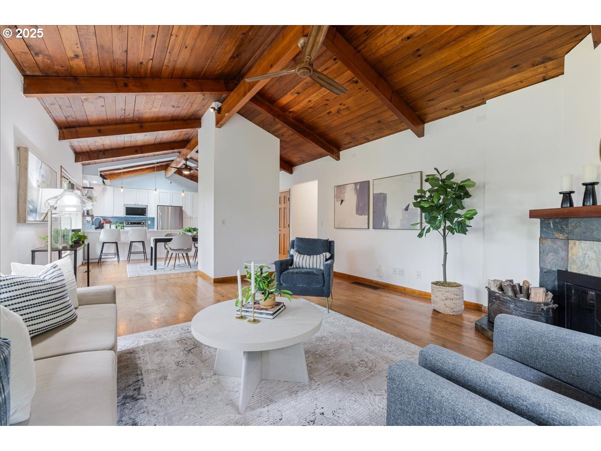 11805 Southwest Belvidere Place Portland, OR 97225 - Photo 7 of 44 a living room with furniture and wooden floor