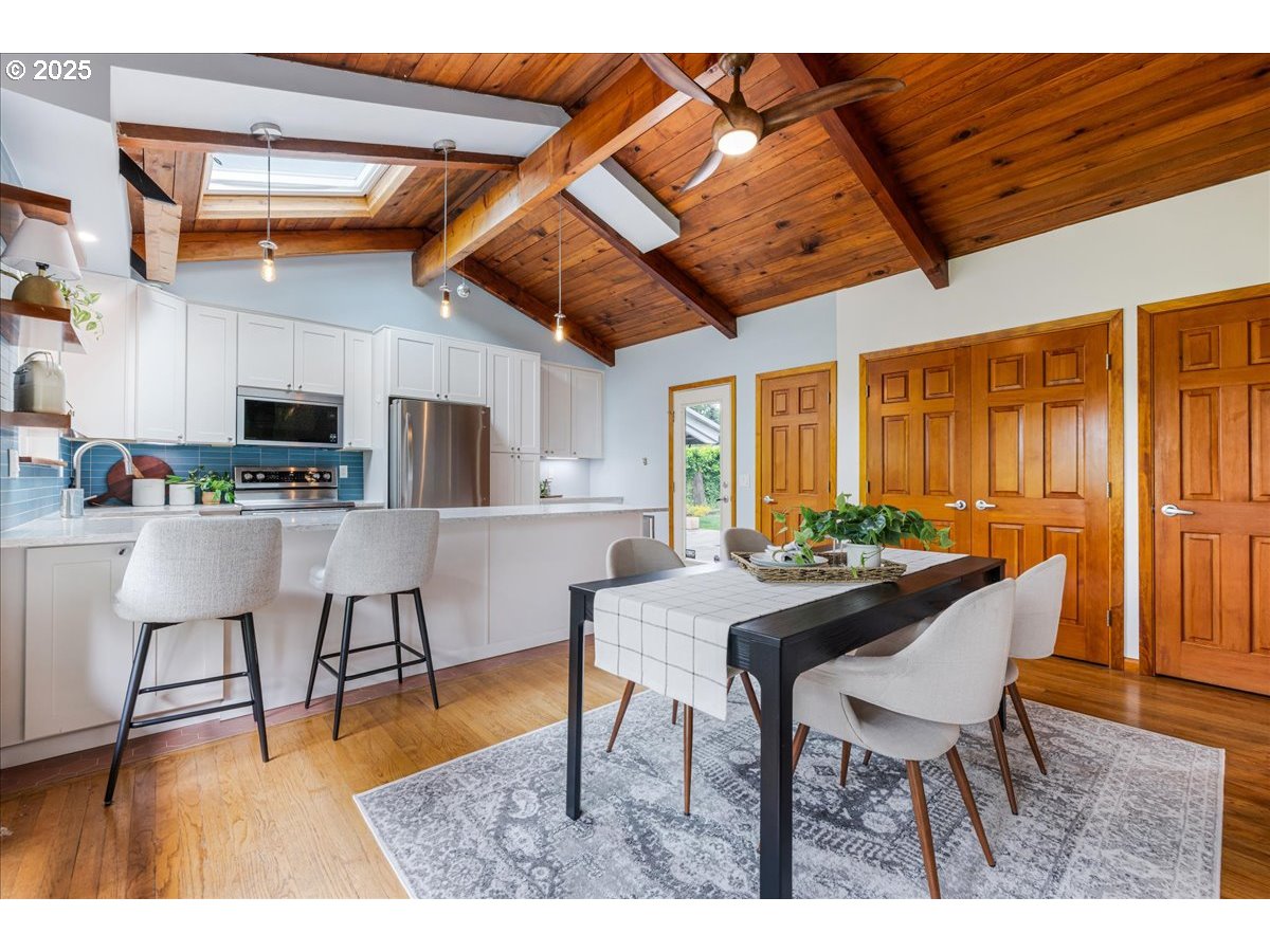 11805 Southwest Belvidere Place Portland, OR 97225 - Photo 9 of 44 a dining room with furniture and window